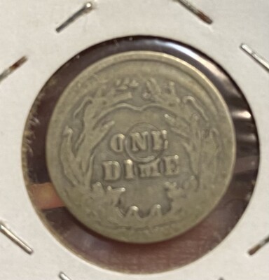 1910 Barber Dime off-center strike error showing shifted design with blank planchet crescent visible