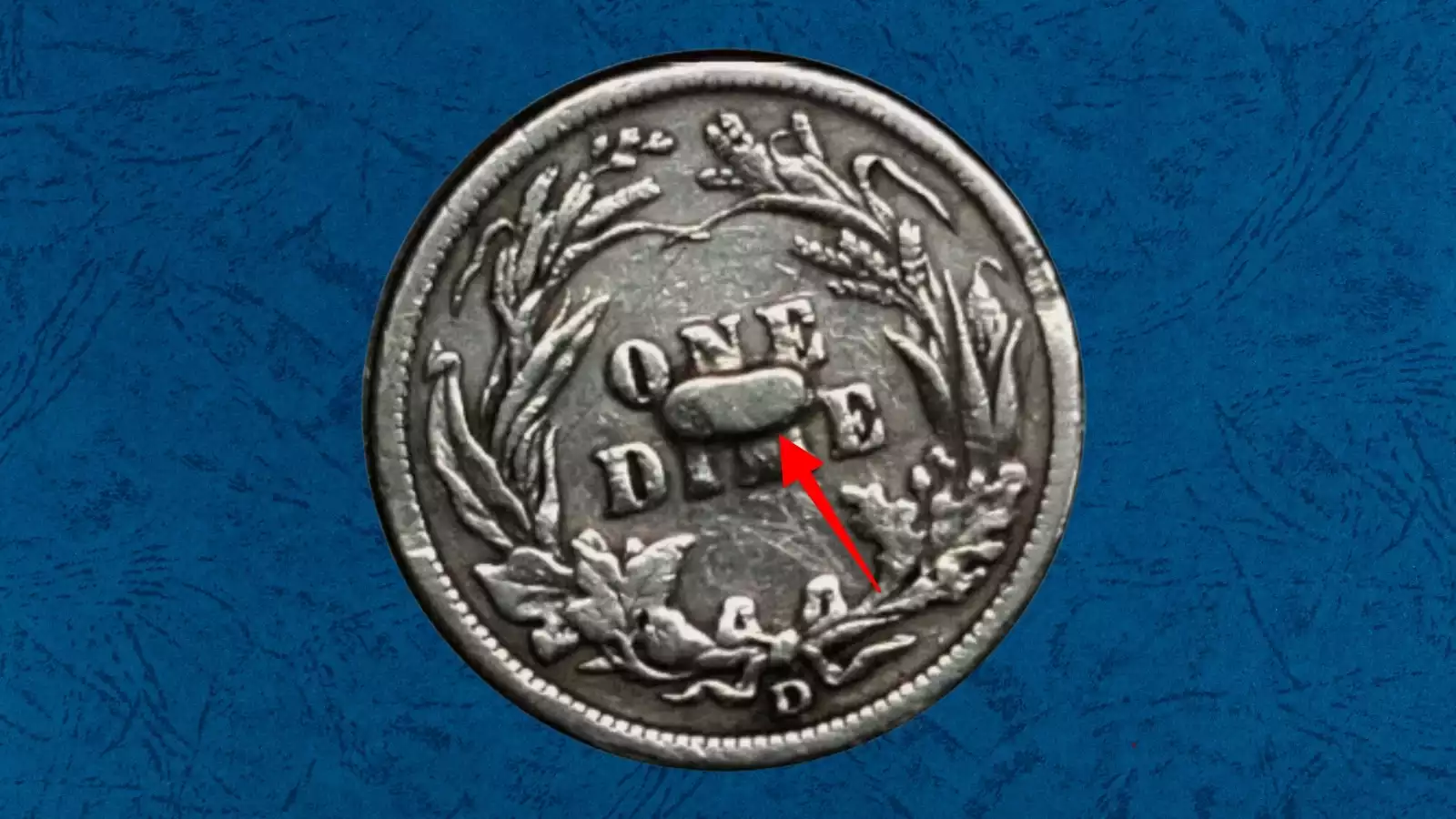 1910 Barber Dime interior die break error showing smooth raised featureless blob over design elements
